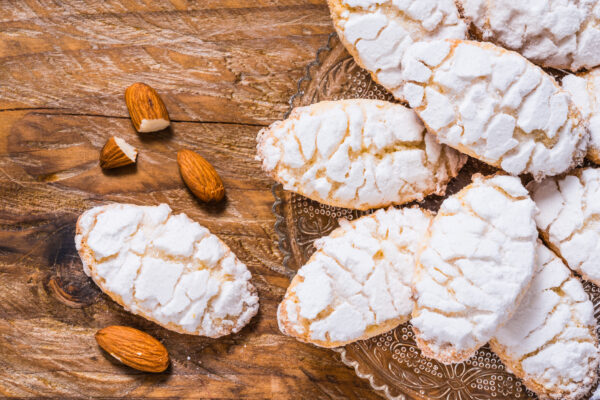 Ricciarelli,Pastries,On,Rustic,Wooden,Background,Top,View.typical,Sienese,Christmas