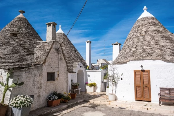 puglia vespa escape trulli alberobello village
